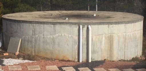 Water Tank With Partially Collapsed Lid